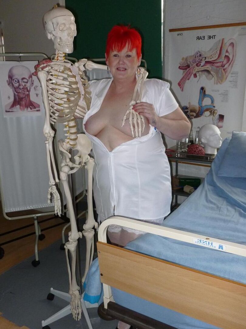 20P Redheaded nurse Valgasmic Exposed and a busty older lady play with a skeleton
