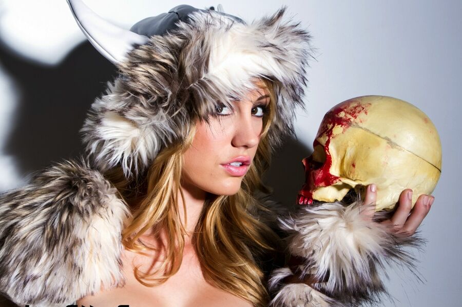 16P Solo model Brett Rossi frees her big tits and bald pussy from Viking attire