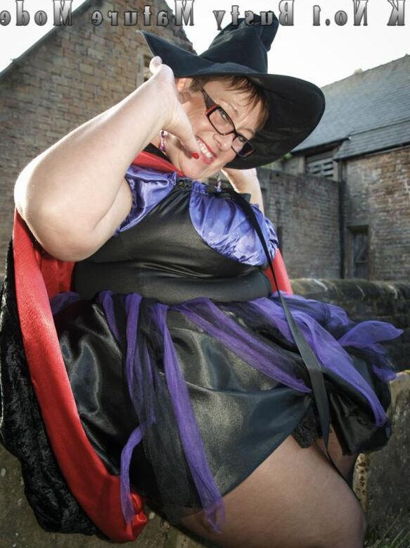 20P Obese amateur Warm Sweet Honey frees her tits and twat from cosplay apparel