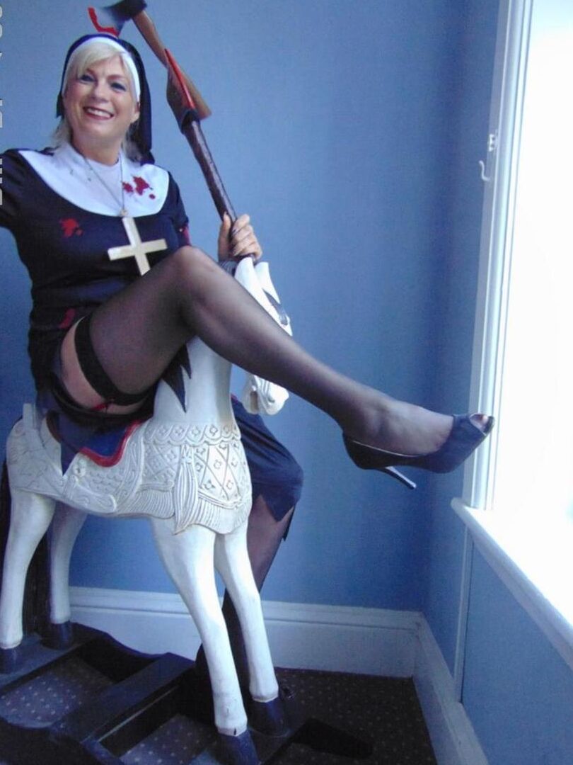 16P Mature amateur Dimonty removes a nun outfit while riding a hobbyhorse