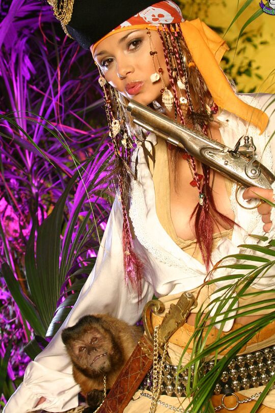 15P Beautiful female pirate Lenka exposes herself amid a lush backdrop