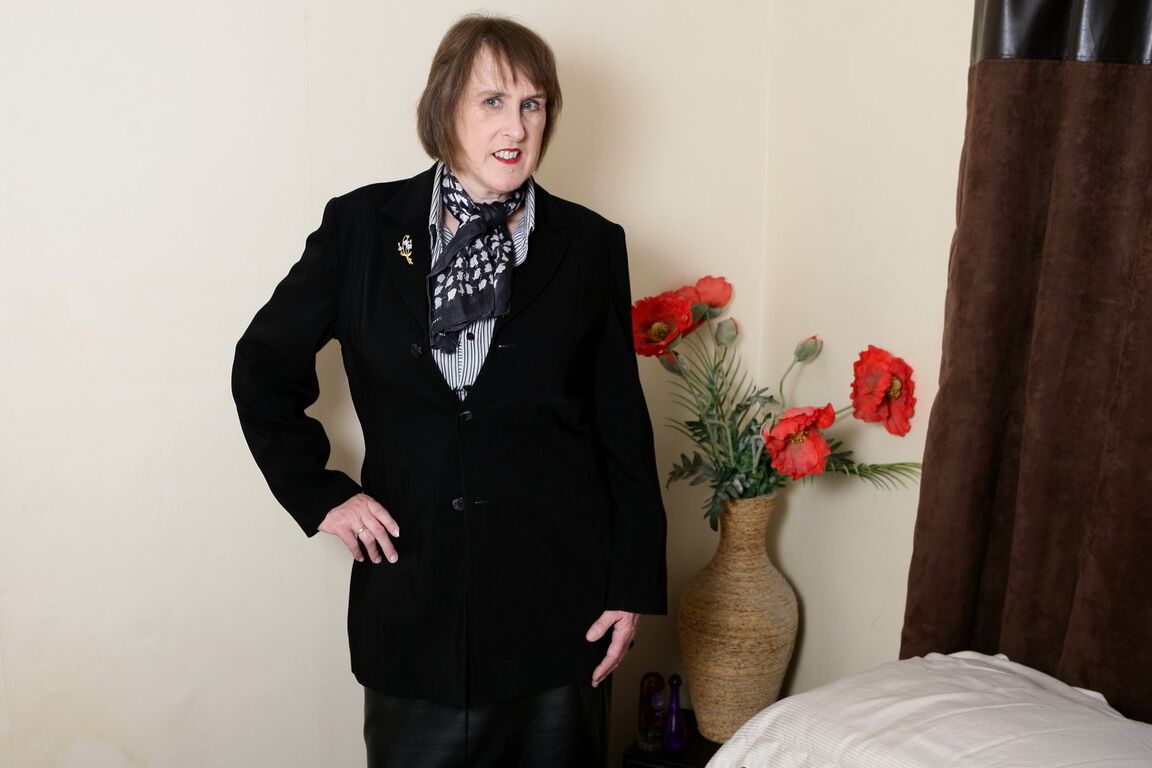 16P British nan licks a nipples as she strips to satin lingerie and mesh stockings