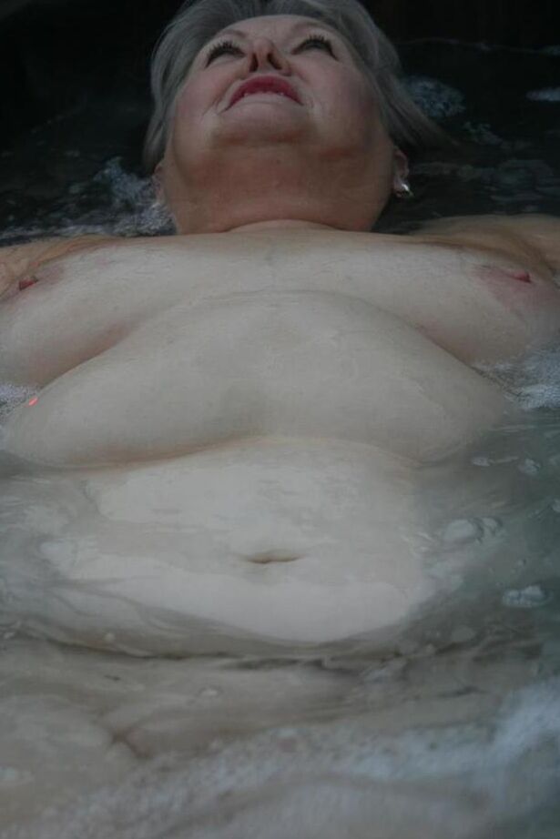 20P Fat oma changes into nylons and heels after lounging naked in hot tub