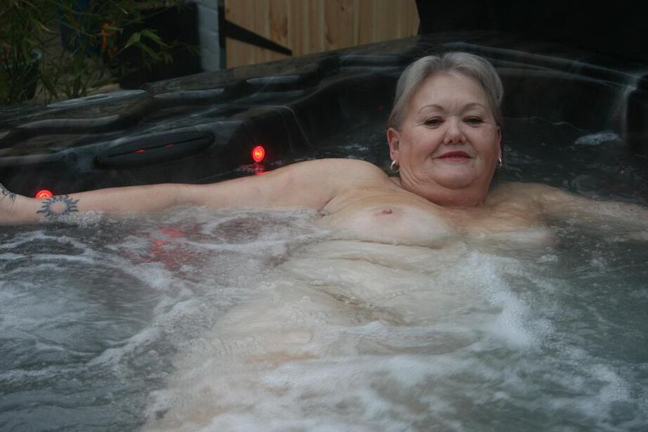 20P Fat oma changes into nylons and heels after lounging naked in hot tub