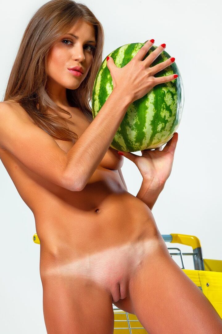 16P Long legged girl Sarah F shops for high carb fruits while totally naked