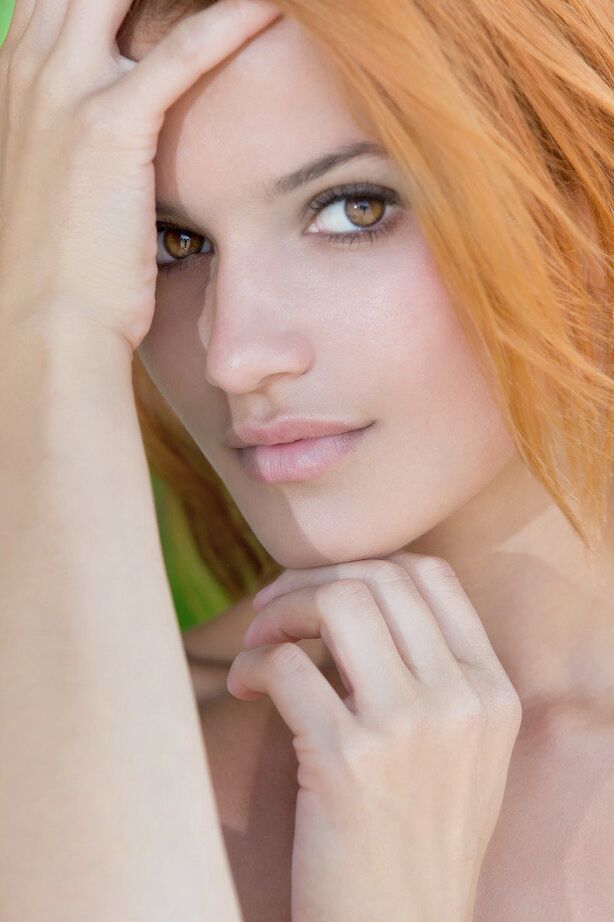 18P Beautiful redhead Violla A strikes confident nude poses amid trees