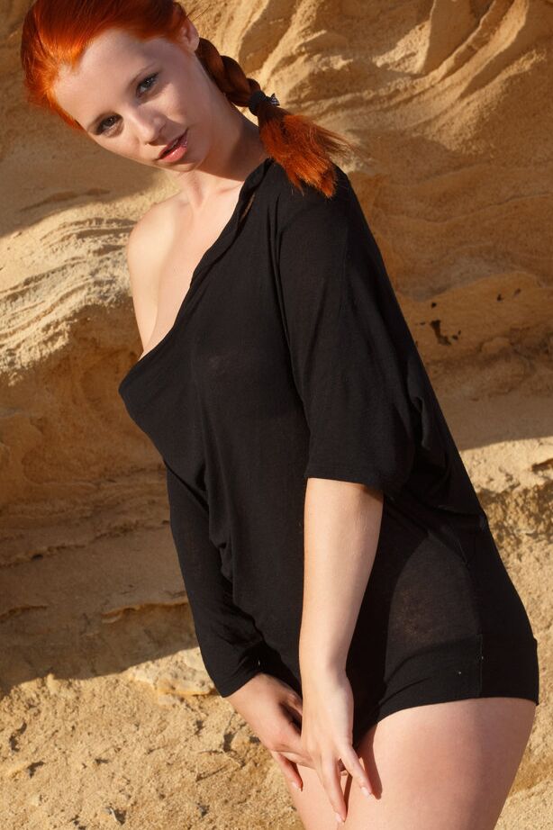 18P Ariel Piper Fawn swings red hair around while stripping for nude glam shoot