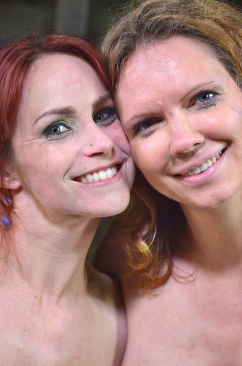16P Naked redhead Bella Rossi is affixed with an fox tail butt plug and clamps