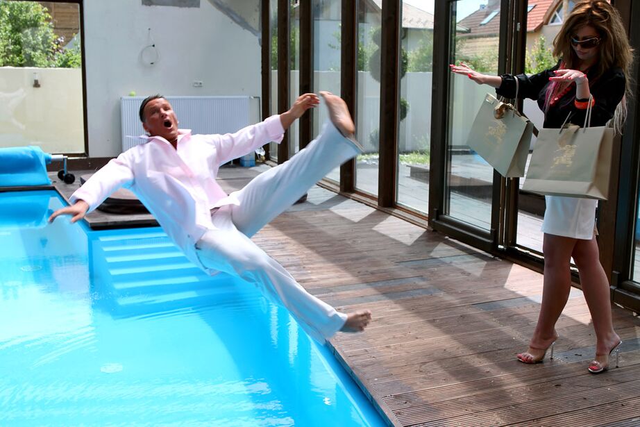 15P Horny couple keeps their clothes on as they fuck in and out of the pool