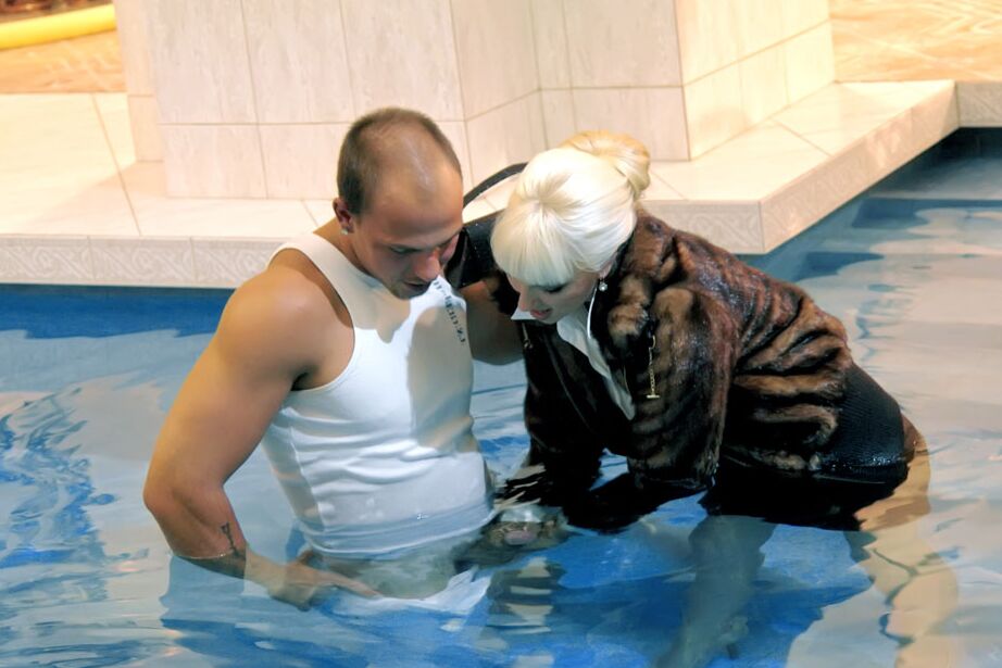 15P Fully clothed blonde wades into an indoor pool for hardcore sex with the help