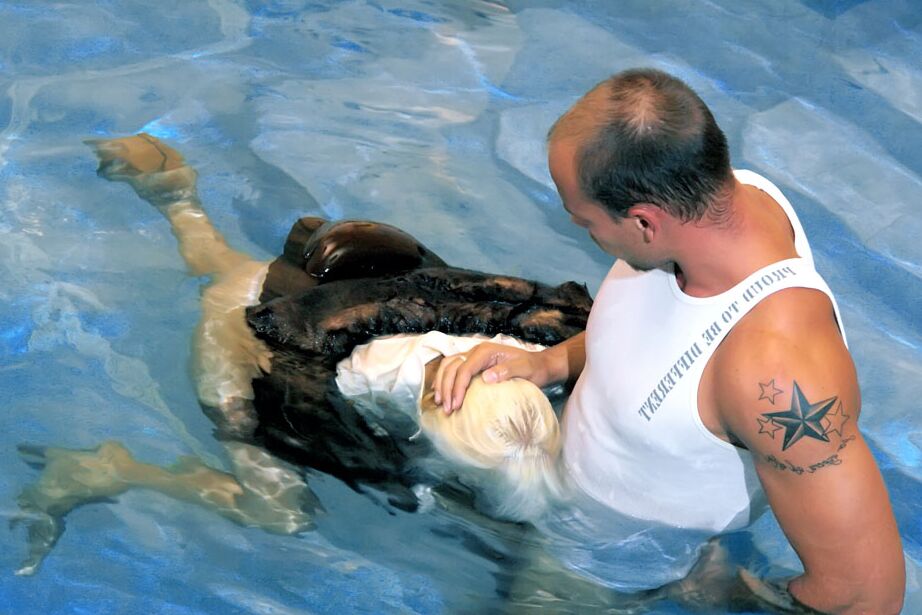 15P Fully clothed blonde wades into an indoor pool for hardcore sex with the help