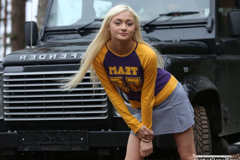 20P Young blonde Sonya gets naked in front of a 4-by-4 vehicle