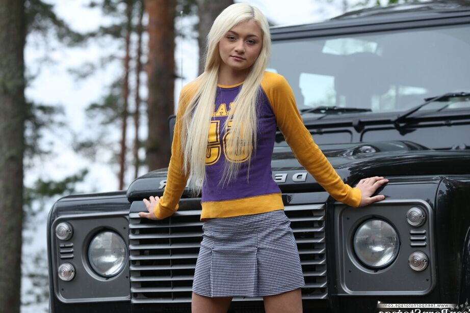 20P Young blonde Sonya gets naked in front of a 4-by-4 vehicle