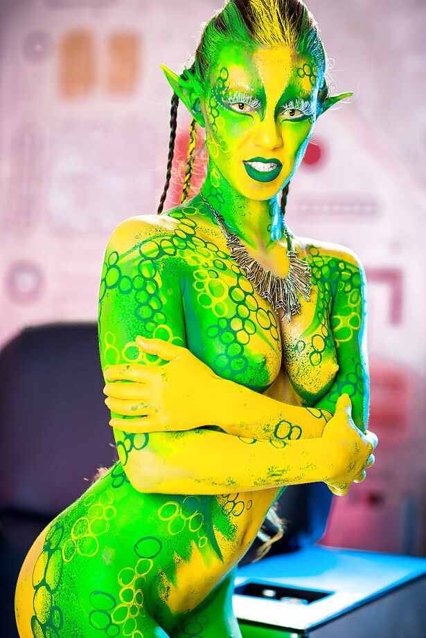 16P Kinky cosplay chick Tiffany Doll posing in body paint uniform and spreading