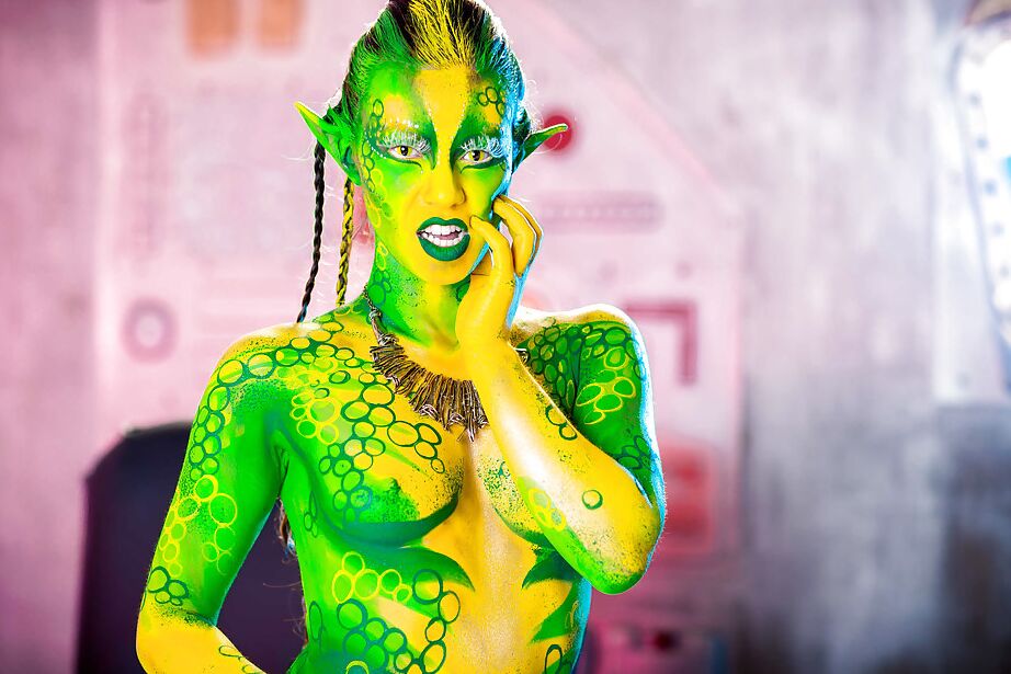 16P Kinky cosplay chick Tiffany Doll posing in body paint uniform and spreading