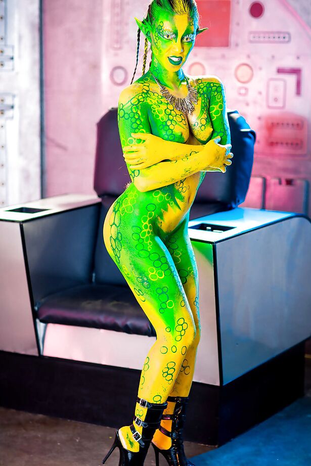 16P Kinky cosplay chick Tiffany Doll posing in body paint uniform and spreading