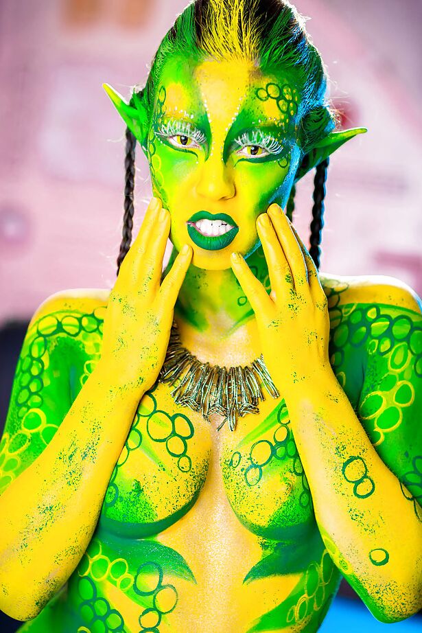 16P Kinky cosplay chick Tiffany Doll posing in body paint uniform and spreading