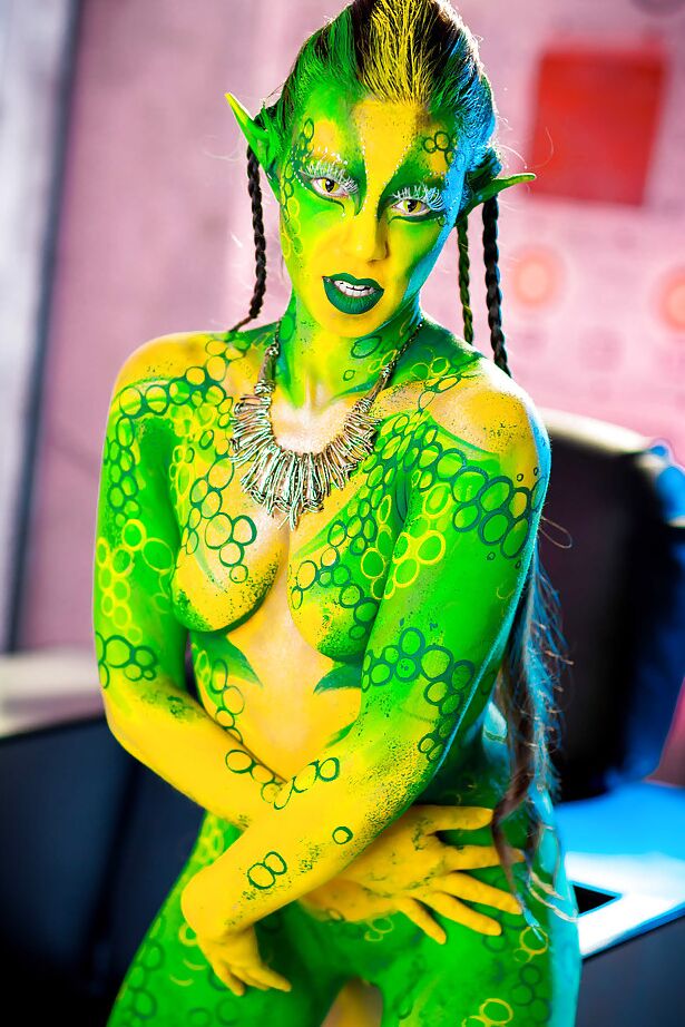 16P Kinky cosplay chick Tiffany Doll posing in body paint uniform and spreading