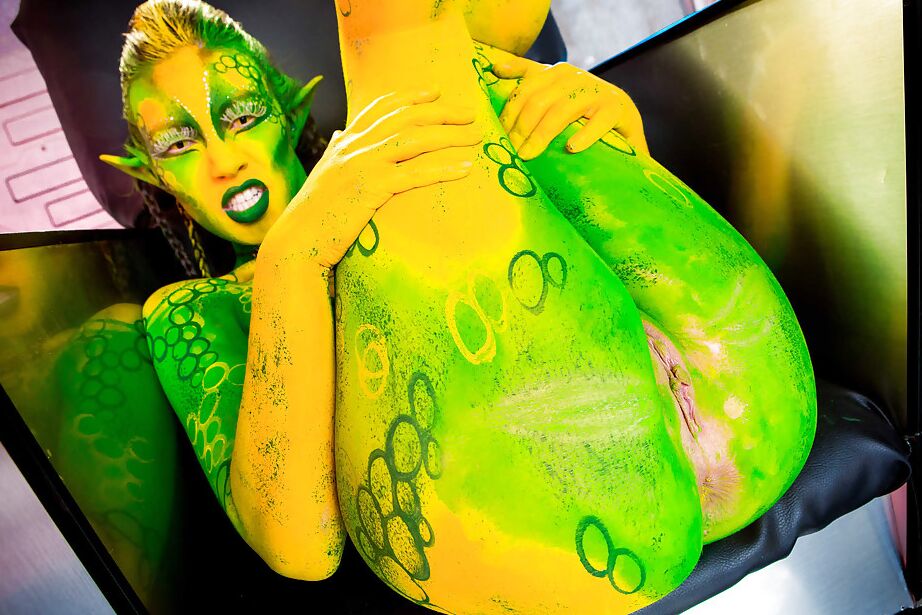 16P Kinky cosplay chick Tiffany Doll posing in body paint uniform and spreading
