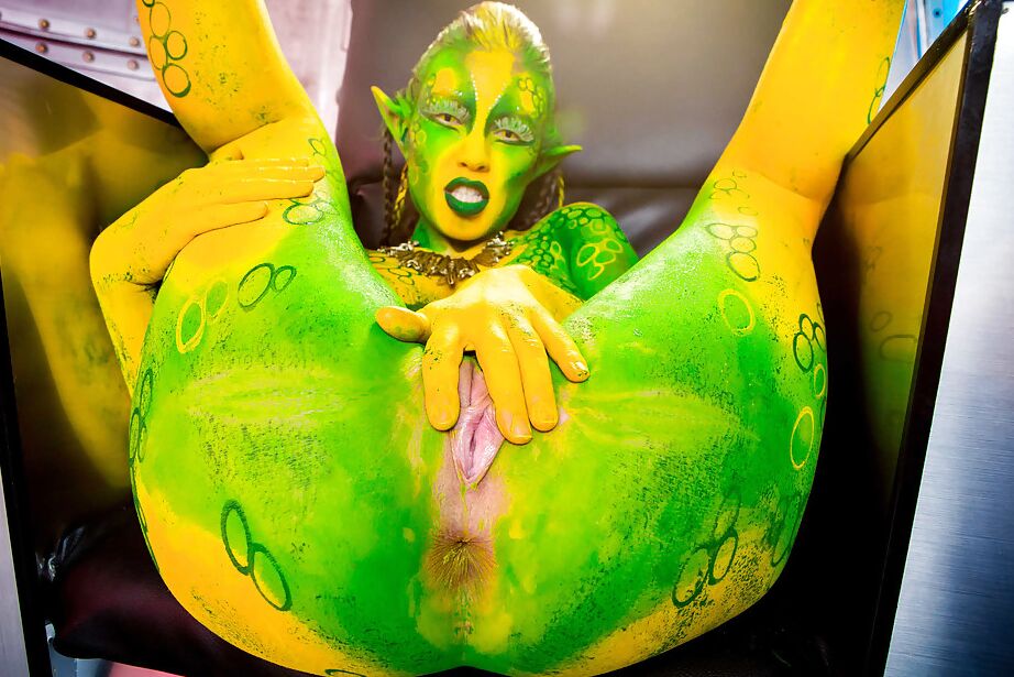 16P Kinky cosplay chick Tiffany Doll posing in body paint uniform and spreading