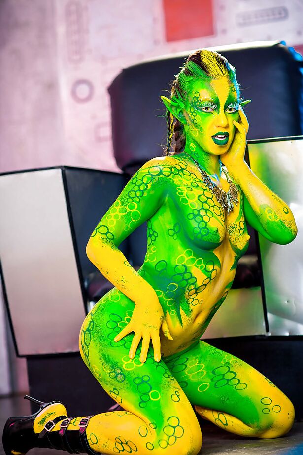 16P Kinky cosplay chick Tiffany Doll posing in body paint uniform and spreading