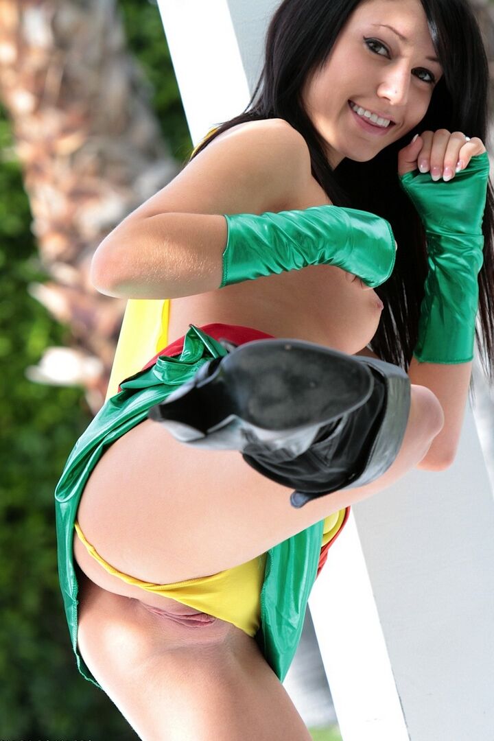 15P Wonder babe Catie Minx flashes her goodies in sexy costume