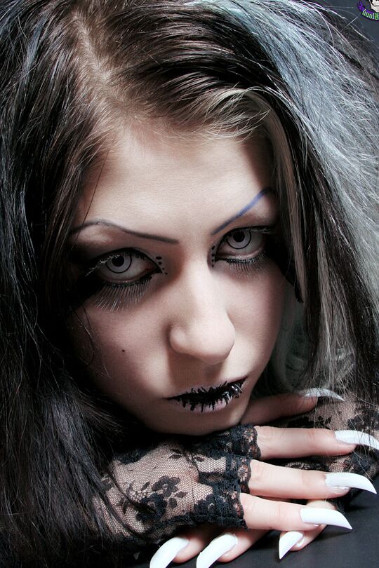 15P Goth girl Mad Sophie sports the Vampire look while exposing herself