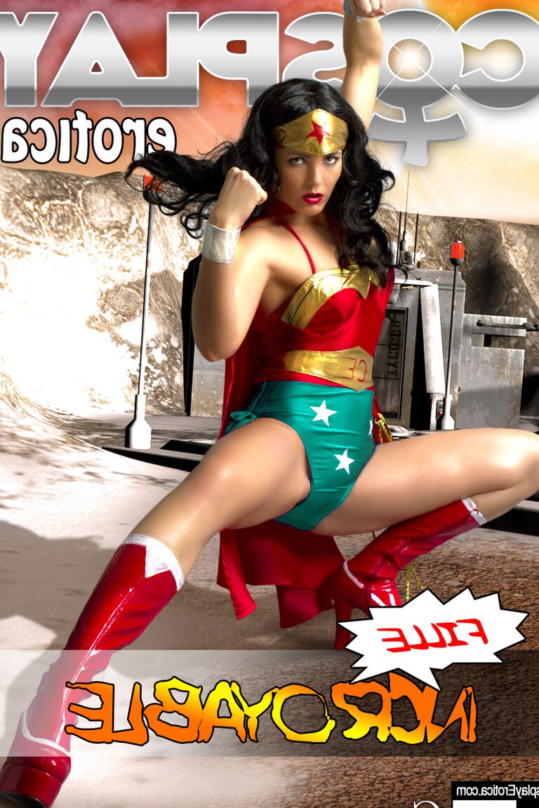 12P Beautiful brunette peels off her Wonder Woman outfit in a tempting manner