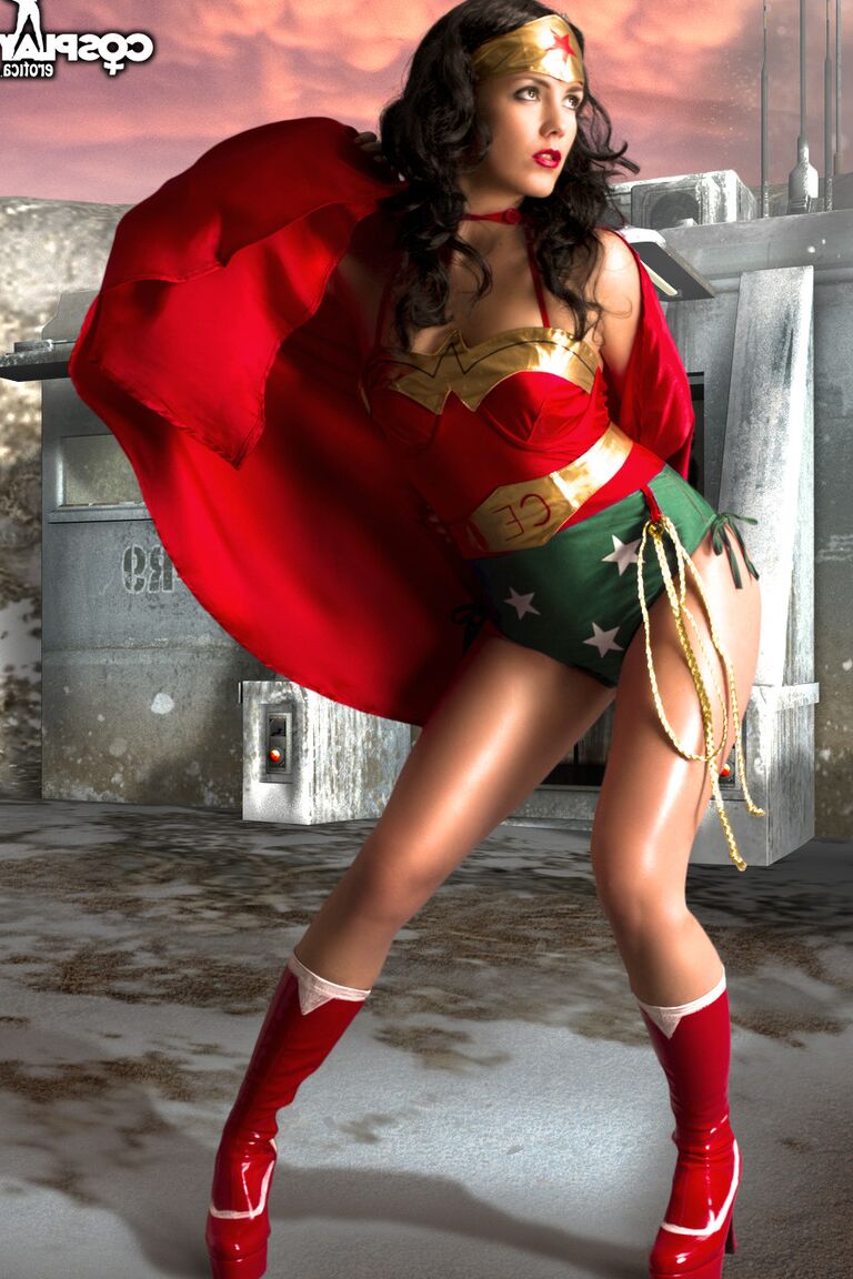 12P Beautiful brunette peels off her Wonder Woman outfit in a tempting manner
