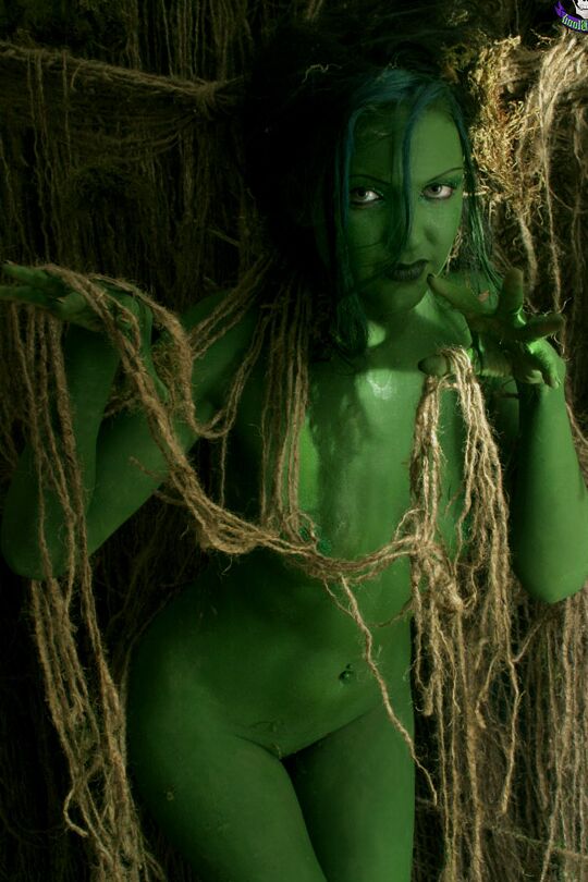 15P Female swamp creature emerges from the dark with no clothes on her naked body