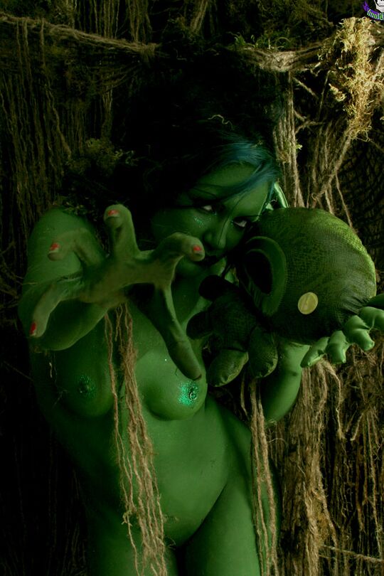 15P Female swamp creature emerges from the dark with no clothes on her naked body
