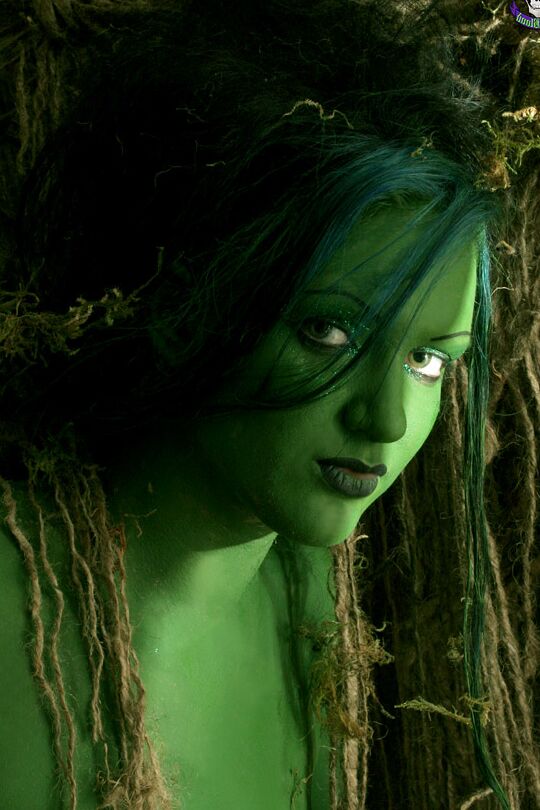 15P Female swamp creature emerges from the dark with no clothes on her naked body