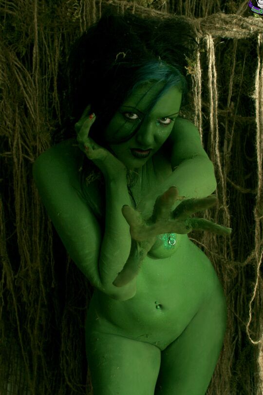 15P Female swamp creature emerges from the dark with no clothes on her naked body
