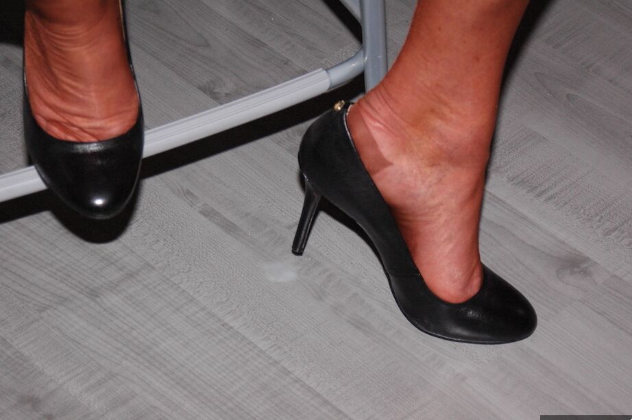 11P Older amateur removes a mask while wearing sheer lingerie and tan nylons