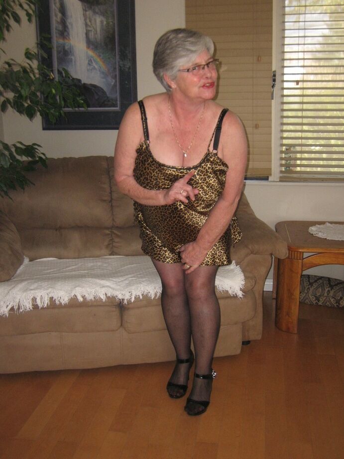 20P Old amateur Girdle Goddess uncovers her large breasts in hosiery and garters