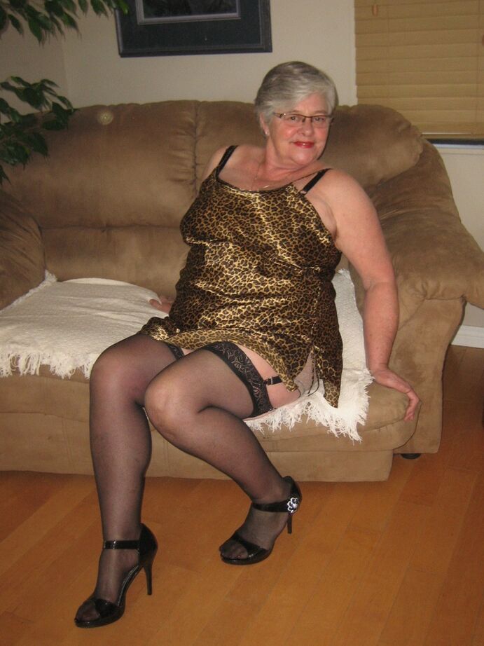 20P Old amateur Girdle Goddess uncovers her large breasts in hosiery and garters