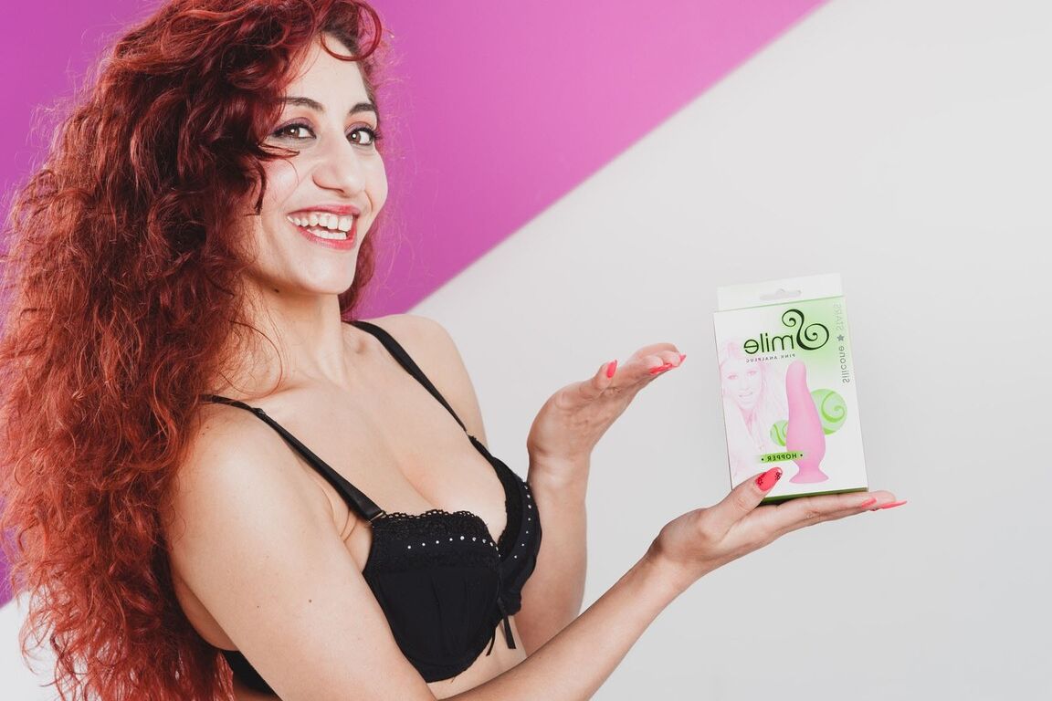 13P Curly haired redhead Dana Santo shoving a dildo deep inside her horny pussy