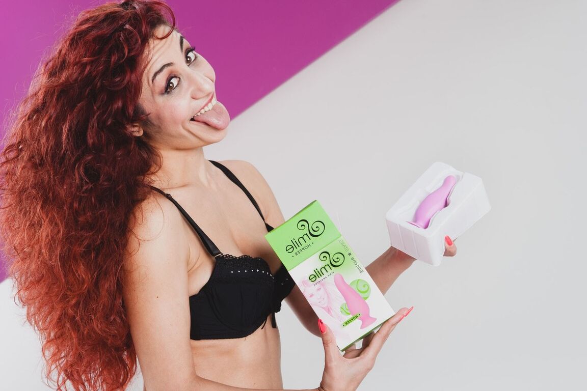 13P Curly haired redhead Dana Santo shoving a dildo deep inside her horny pussy