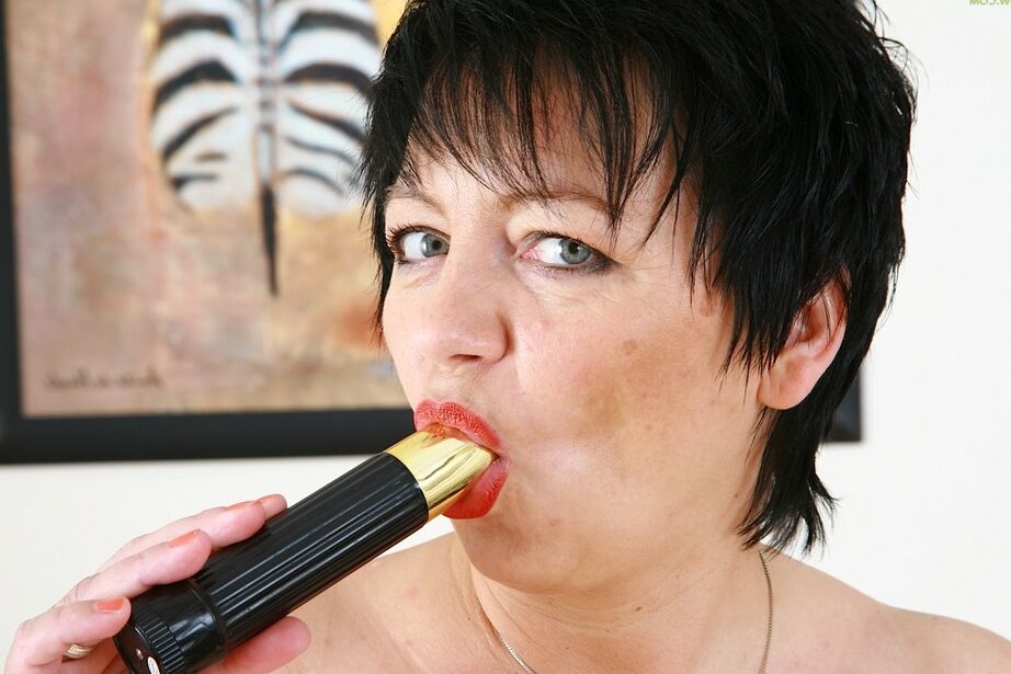 16P Mature BBW Petra spreads her tan nylon clad legs to insert a toy in her twat
