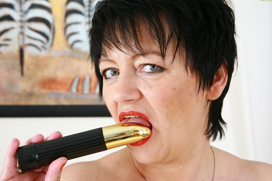 16P Mature BBW Petra spreads her tan nylon clad legs to insert a toy in her twat