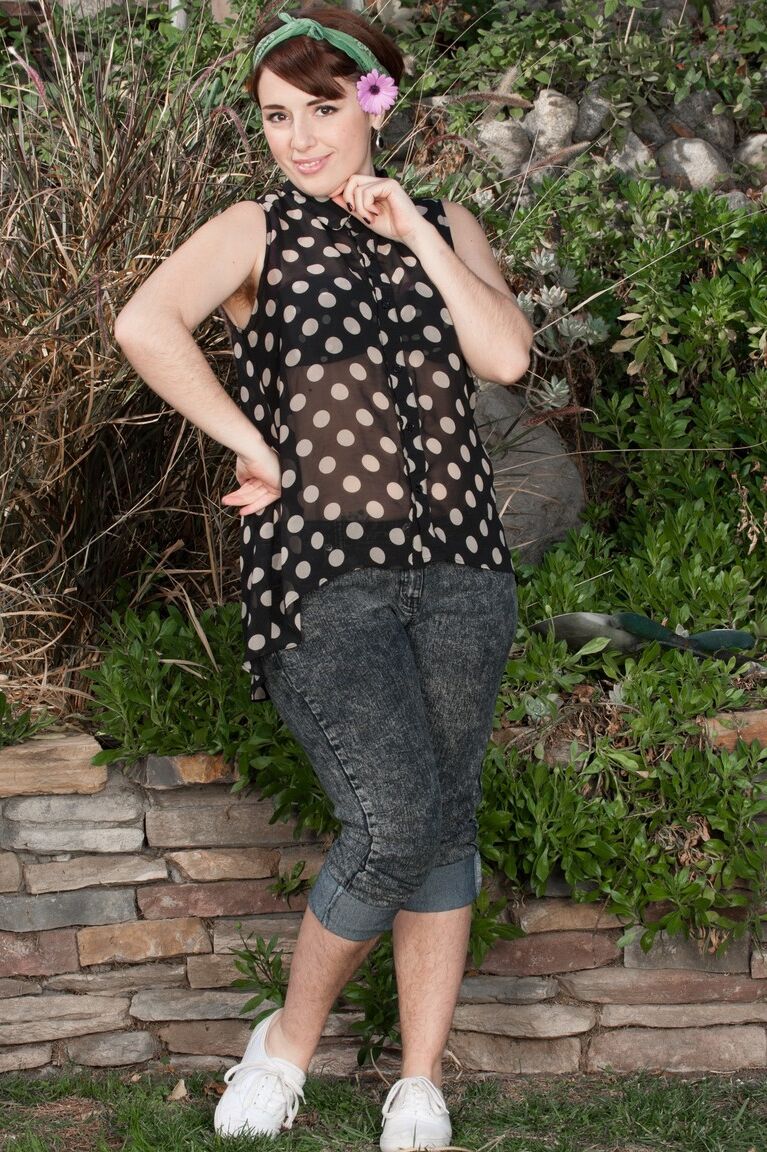 17P Chubby redhead Simone reveals her hairy legs and bushy cunt in the garden