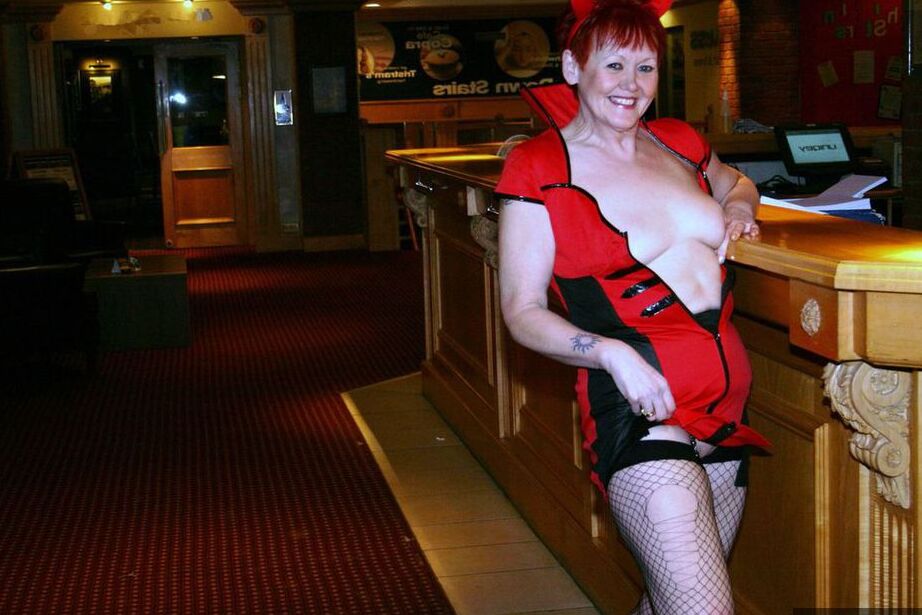 20P Older redhead Valgasmic Exposed exposes herself while wearing devil horns