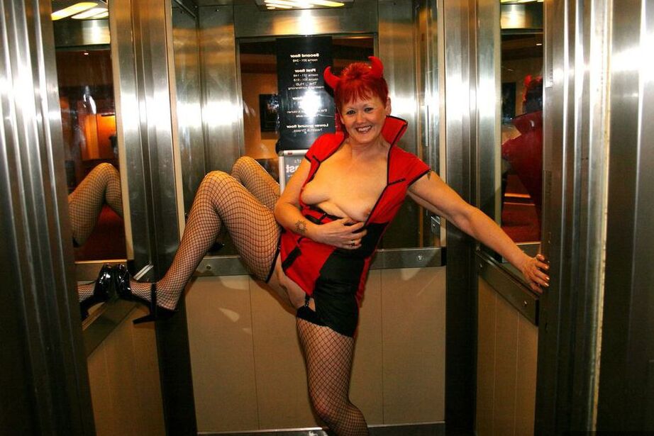 20P Older redhead Valgasmic Exposed exposes herself while wearing devil horns