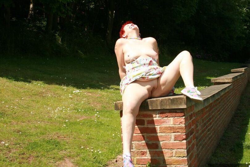 20P Older redhead Valgasmic Exposed gets totally naked in a public park