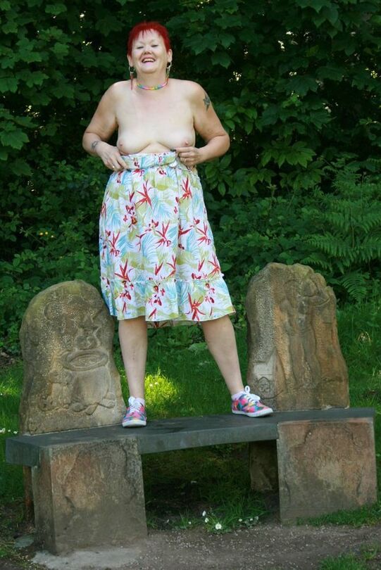 20P Older redhead Valgasmic Exposed gets totally naked in a public park