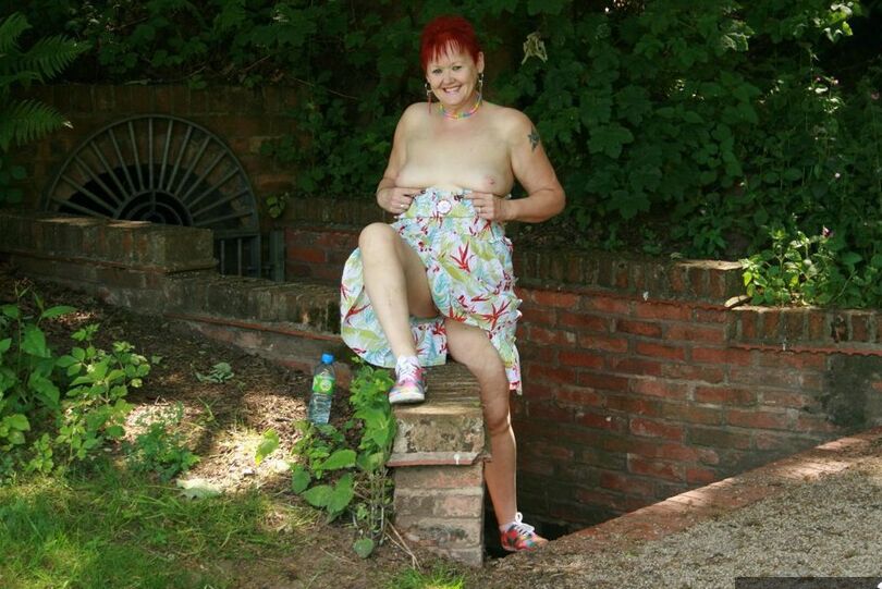 20P Older redhead Valgasmic Exposed gets totally naked in a public park