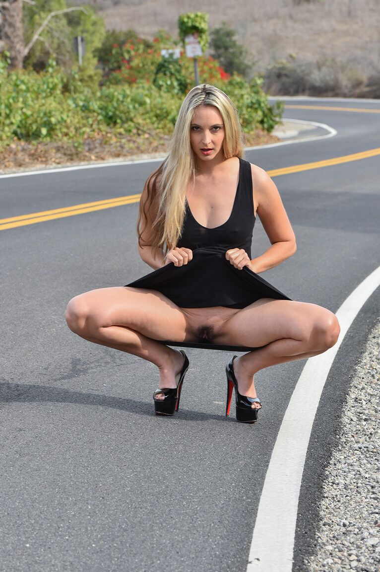 21P Pantyless model Allie flashes her pussy and round ass on the road