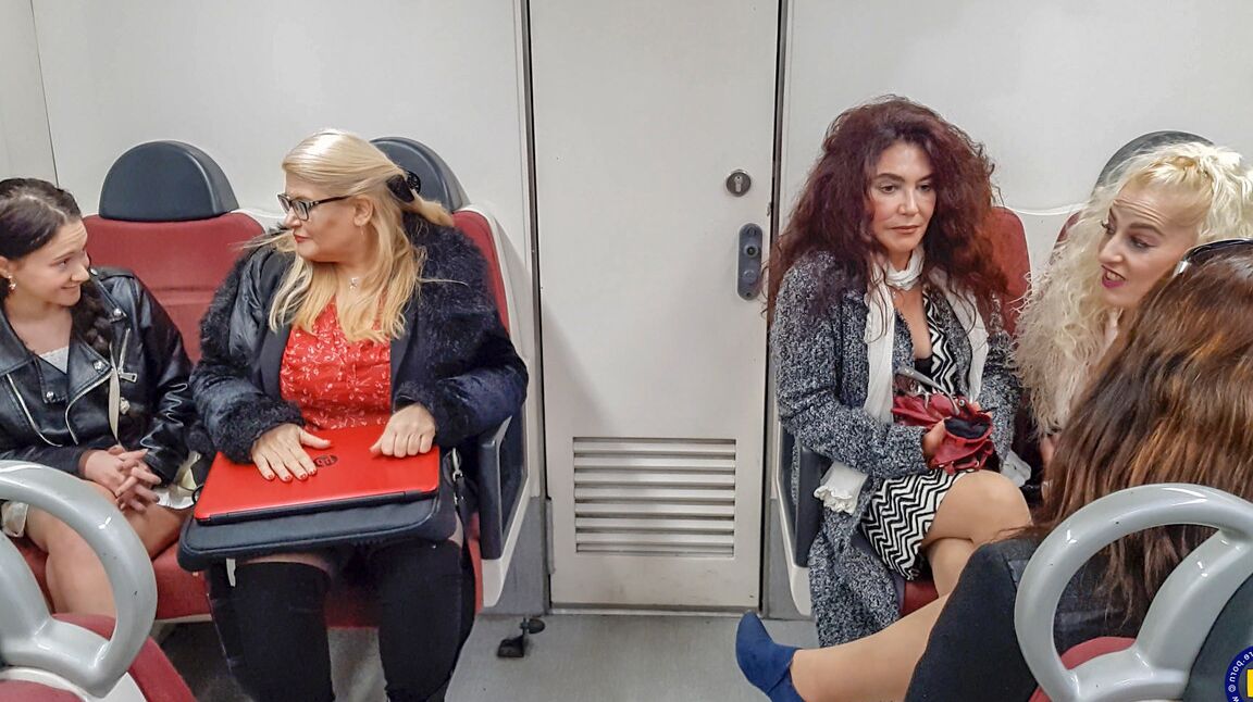 21P Old & young lesbians pose seductively on the couch after a train ride