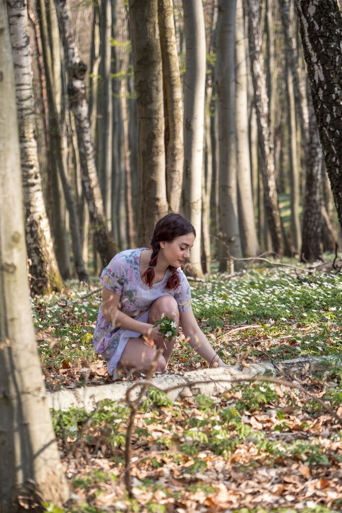 20P First timer Gloria bares her young girl's body on a fallen tree in the woods