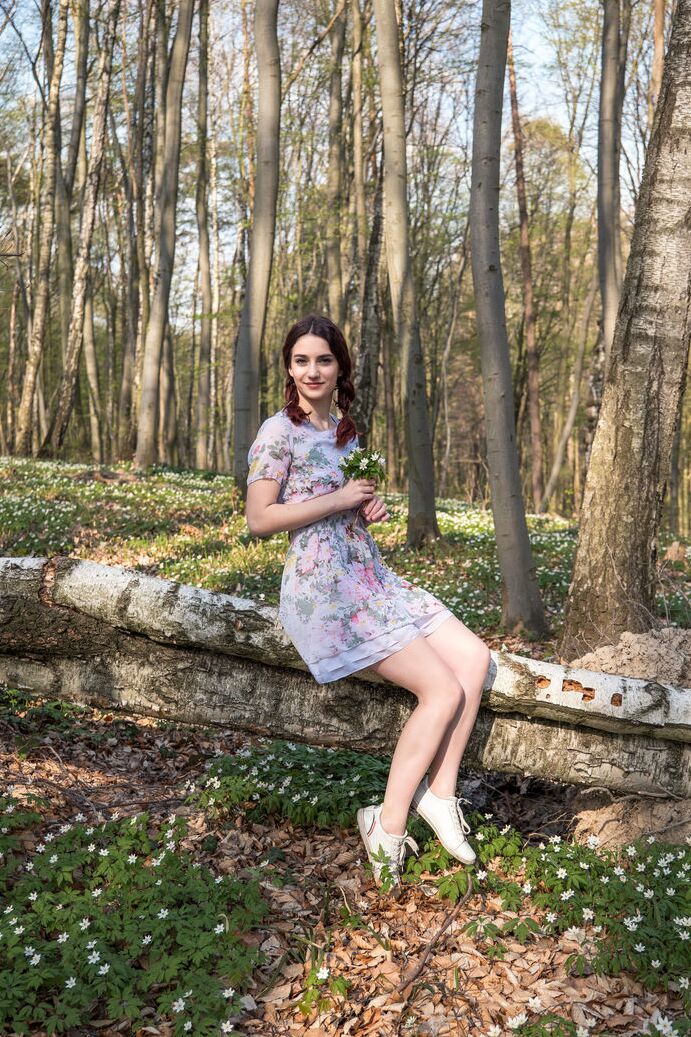 20P First timer Gloria bares her young girl's body on a fallen tree in the woods